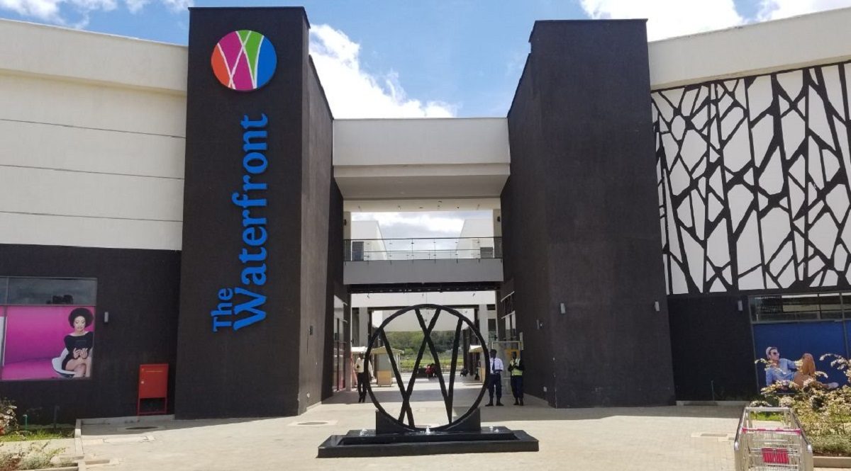 The Waterfront Karen — main entrance and signature blue signage on Karen Road
